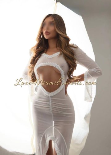 Lola posing in sexy white dress on this professional photo