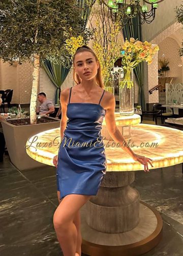 Elza posing in sexy blue dress