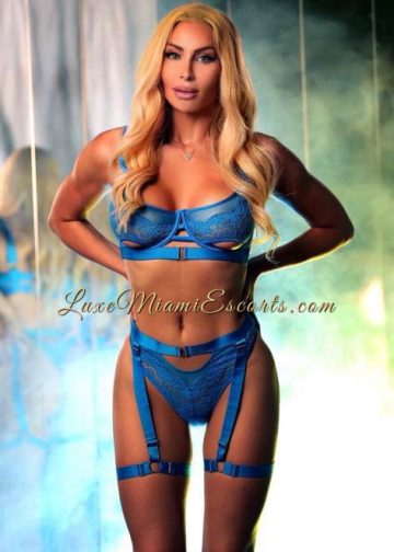 Gabriela posing in her sexy light blue lingerie