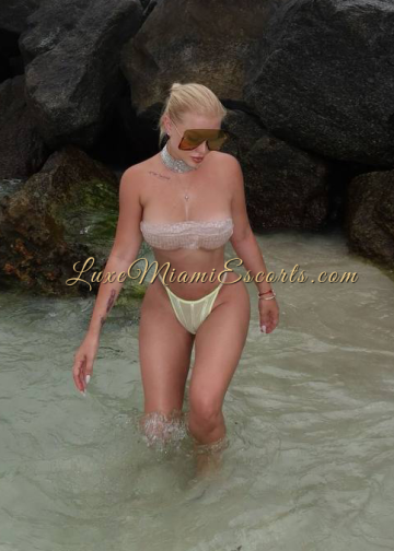 Gorgeous blonde model Oksana posing in swimwear